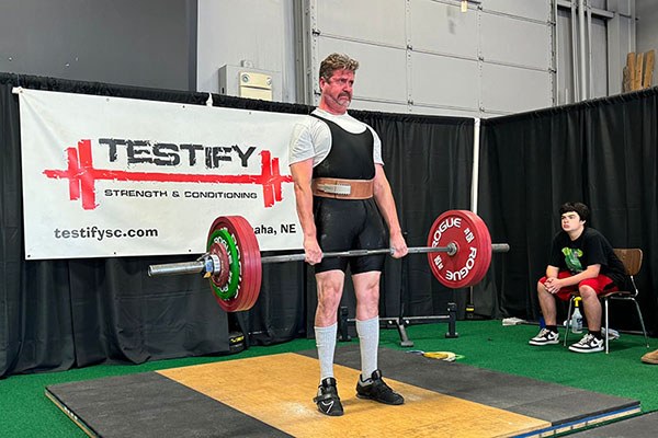 brad locks out a 200 kg deadlift