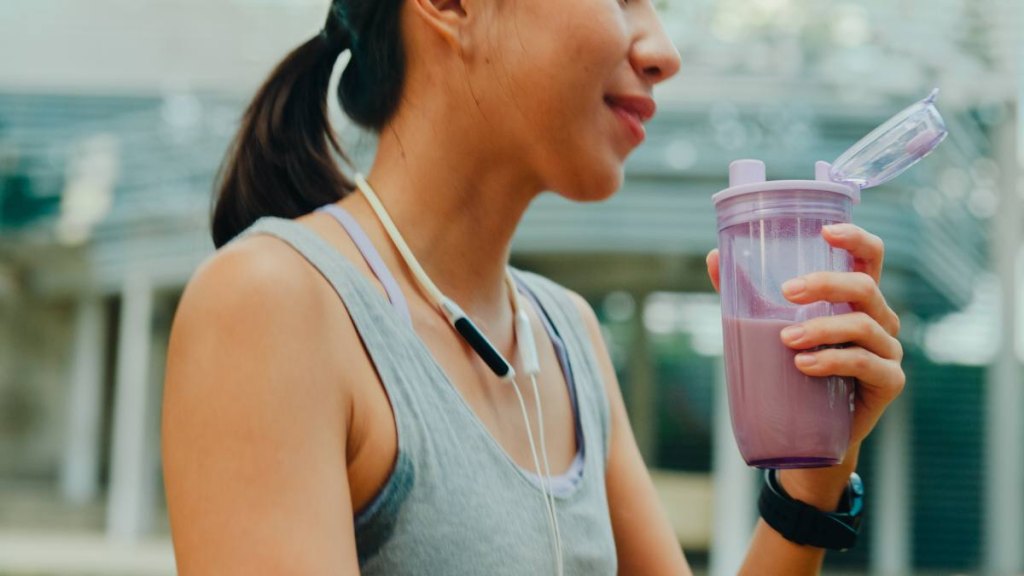 Woman drinking protein shake