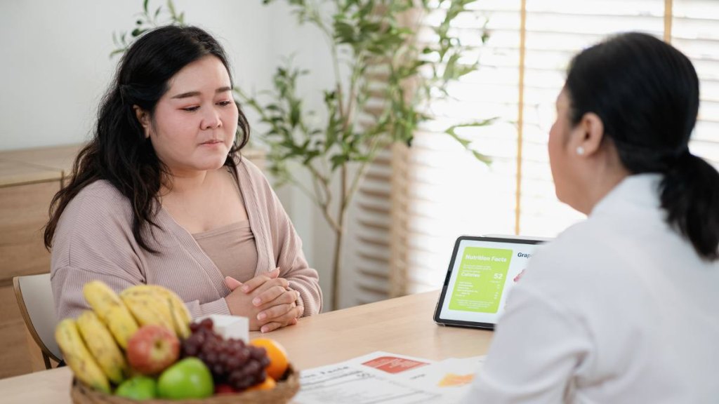 Woman visiting doctor