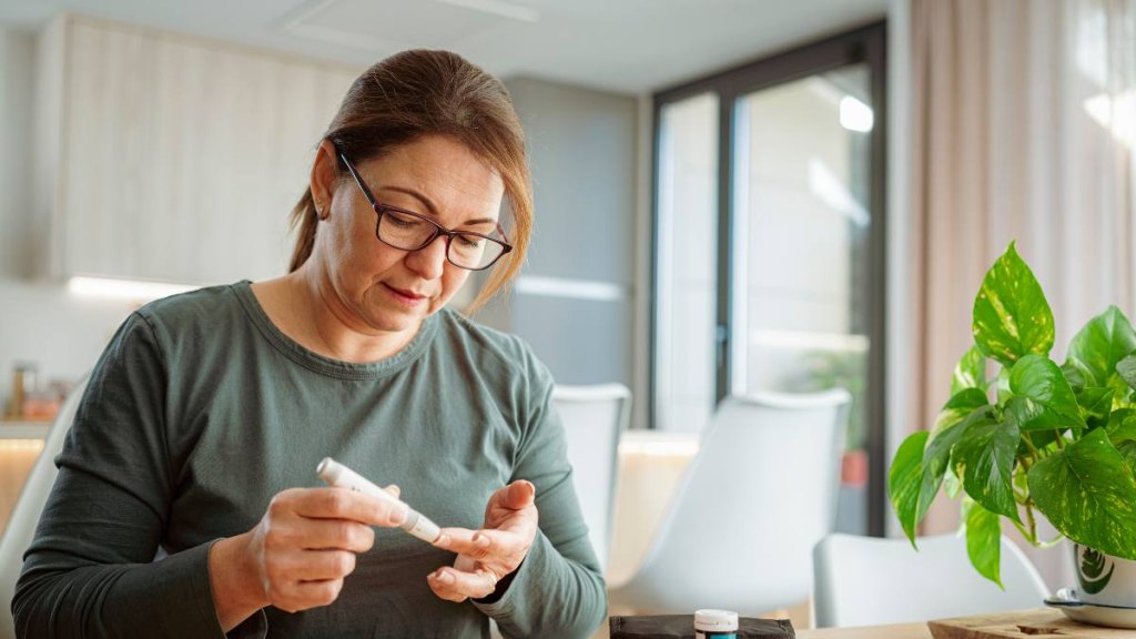 Woman checking insulin levels