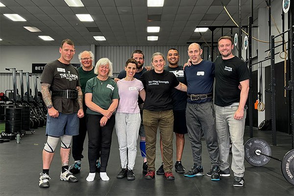 group photo of coaches and attendees at the new zealand training camp