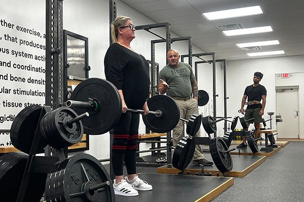 aj locks out a deadlift