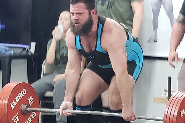 tony stein in the middle of a successful deadlift attempt