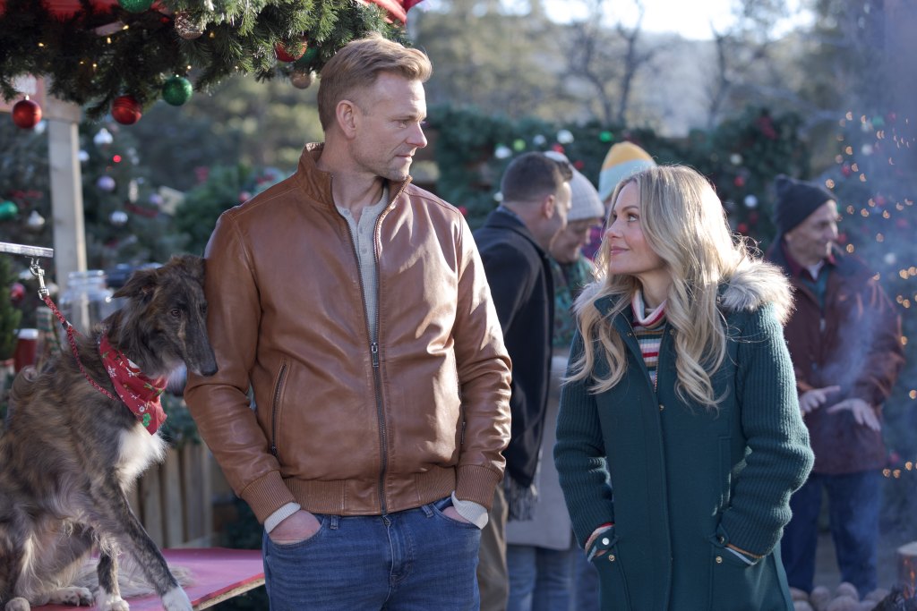 Candace Cameron Bure and Eric Johnson in A Christmas Less Traveled