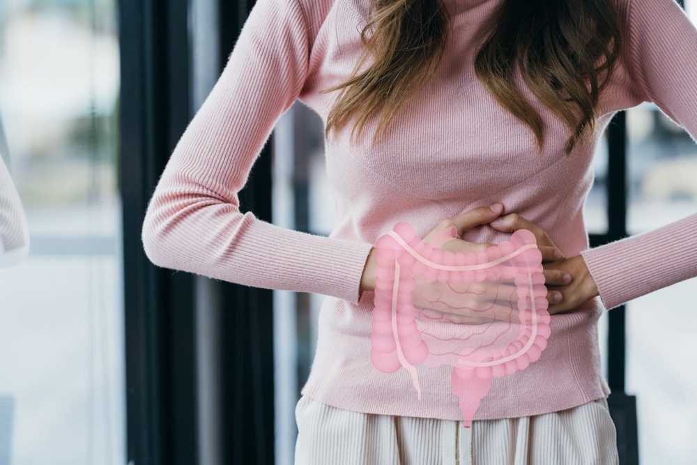 woman hands touching on stomach with intestine virtual icon