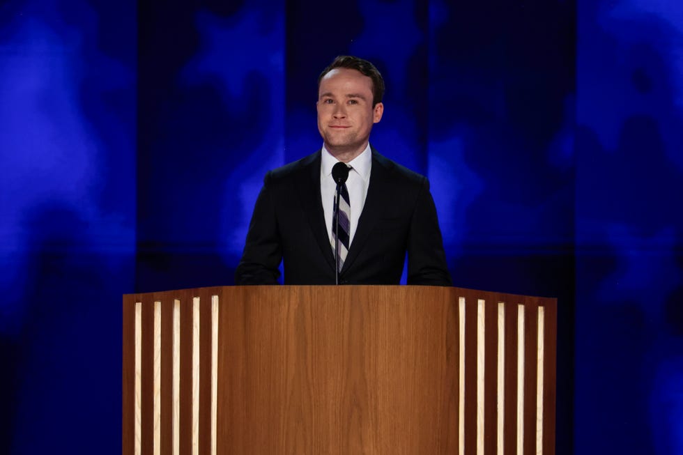 cole emhoff speaks at a podium