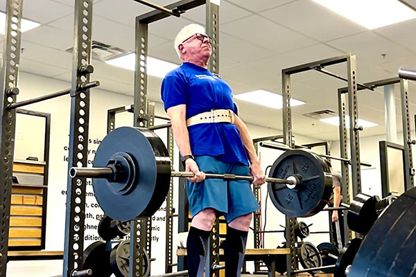 stephen locking out a 330 deadlift