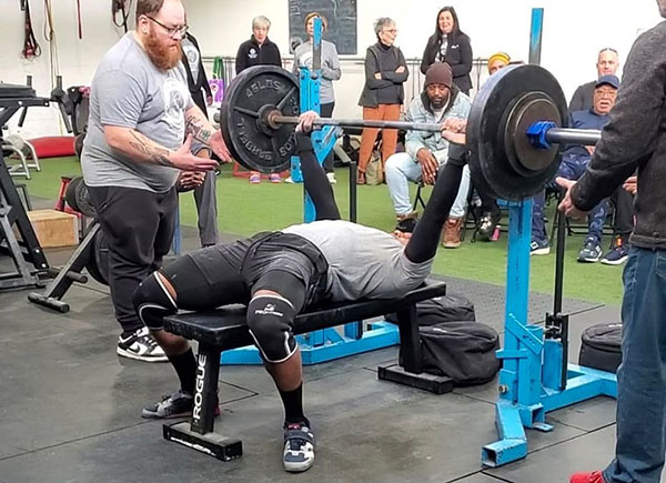 devere at the lockout of a pr 295 bench press