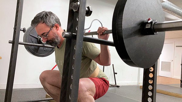 simon squatting 225 for fives in his nlp