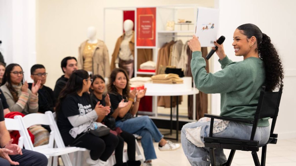 woman reading to audience