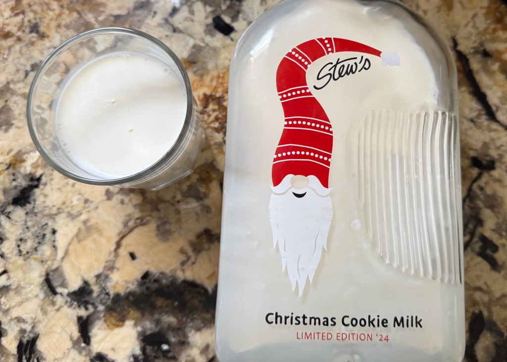 A glass of Stew Leonard's 2024 Christmas cookie milk