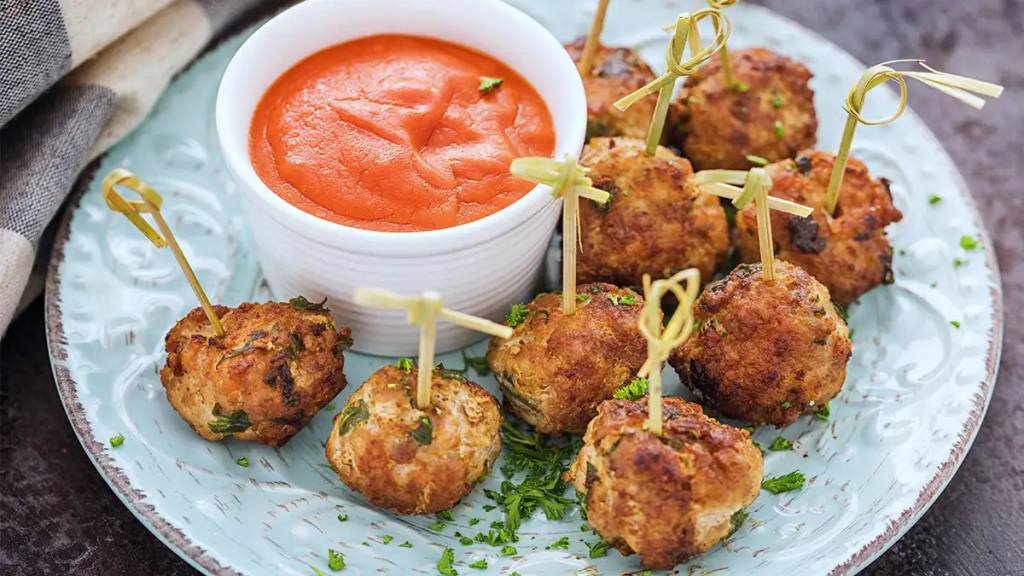 Air fryer meatballs as part of a recipe roundup of New Year's Eve appetizers