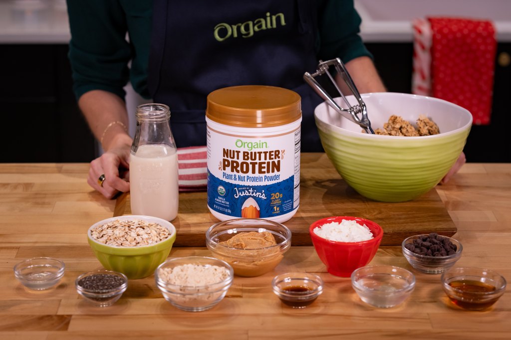 Ali Manno-Fedotowsky with ingredients for Orgain healthy protein desserts