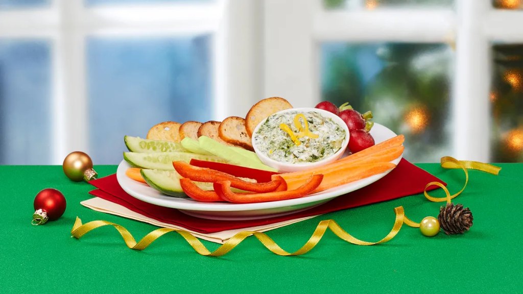 Caramelized onion and spinach dip as part of a recipe roundup of New Year's Eve appetizers