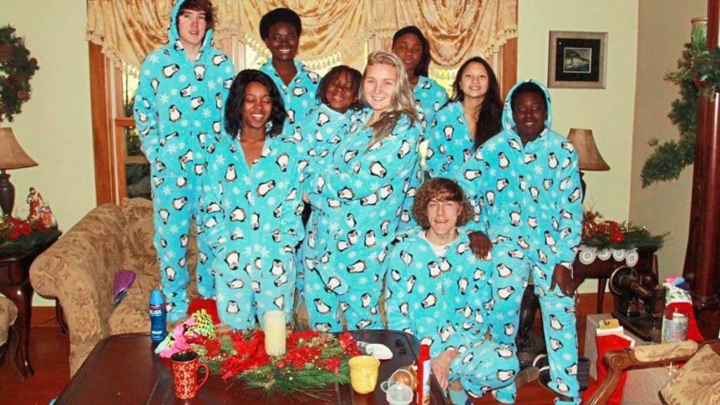 Delilah's children, including Zack and Sammy, happily pose in matching Christmas pajamas