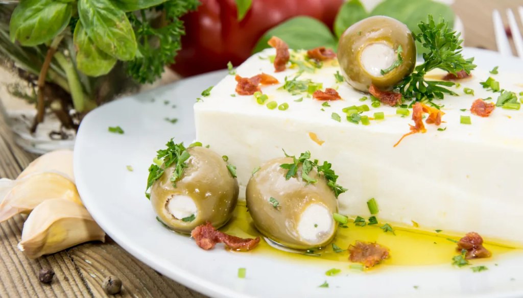 Stuffed olives as part of a recipe roundup of New Year's Eve appetizers