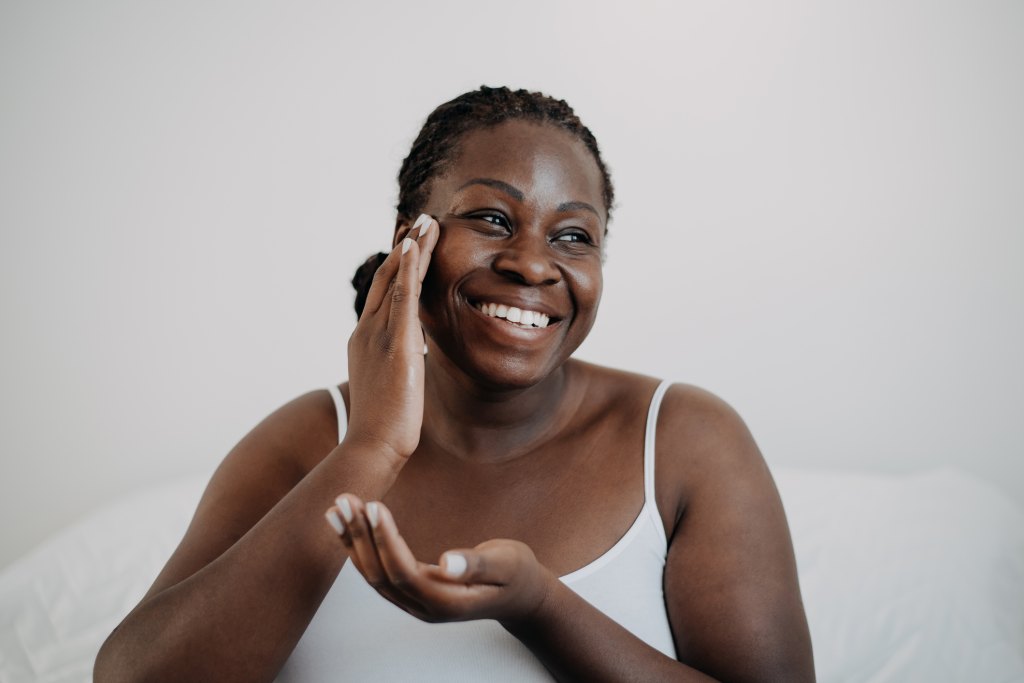 mature woman using skincare for dry, mature skin