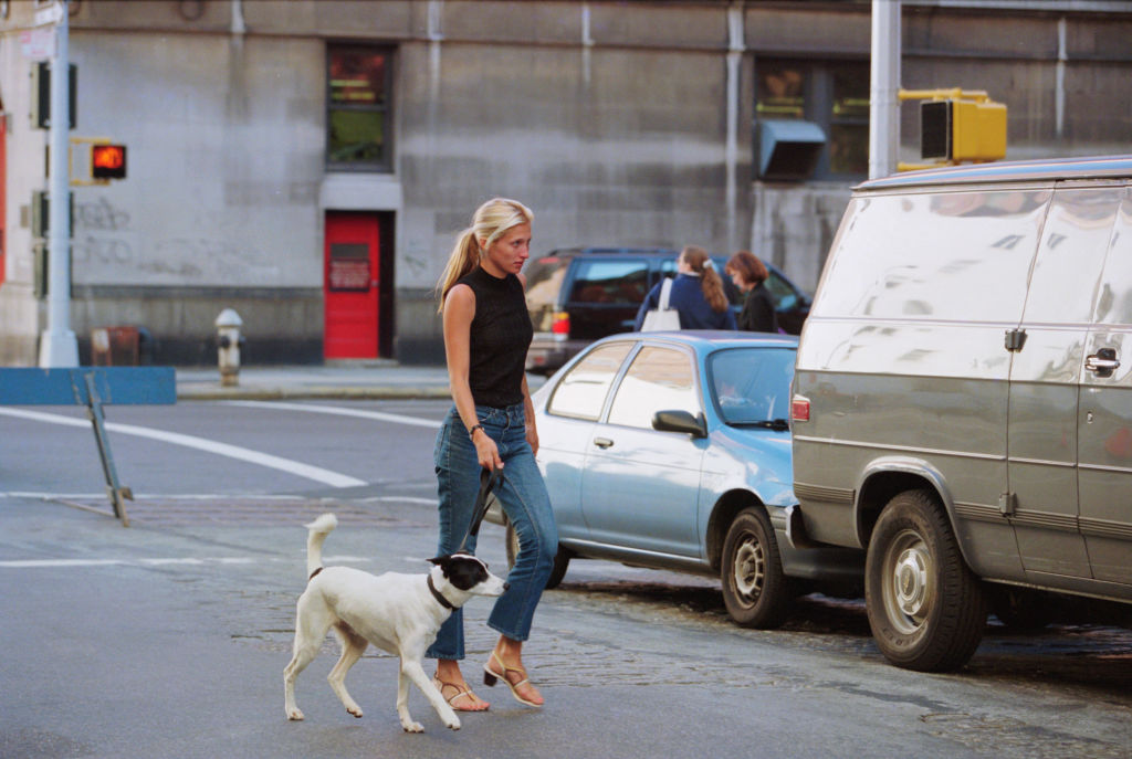 Carolyn Bessette Kennedy walking her dog