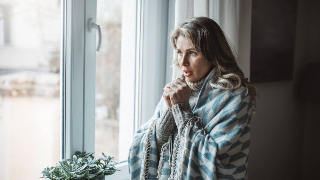 Woman having a cold flash