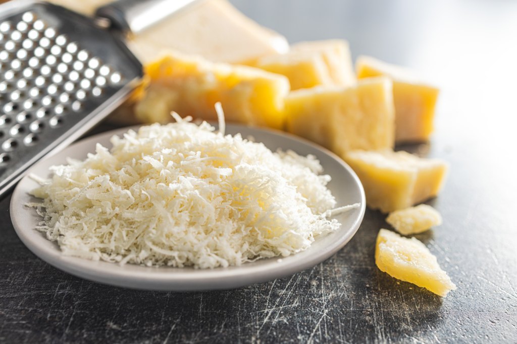 Grated parmesan cheese in the bowl