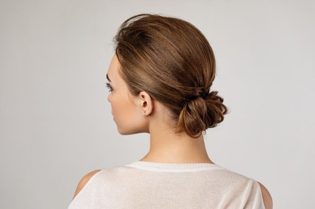 woman with low bun hairstyle