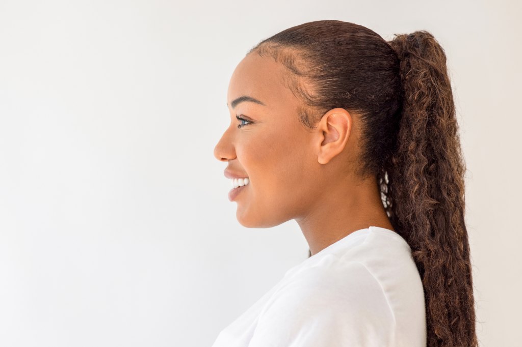 woman with a slick back ponytail