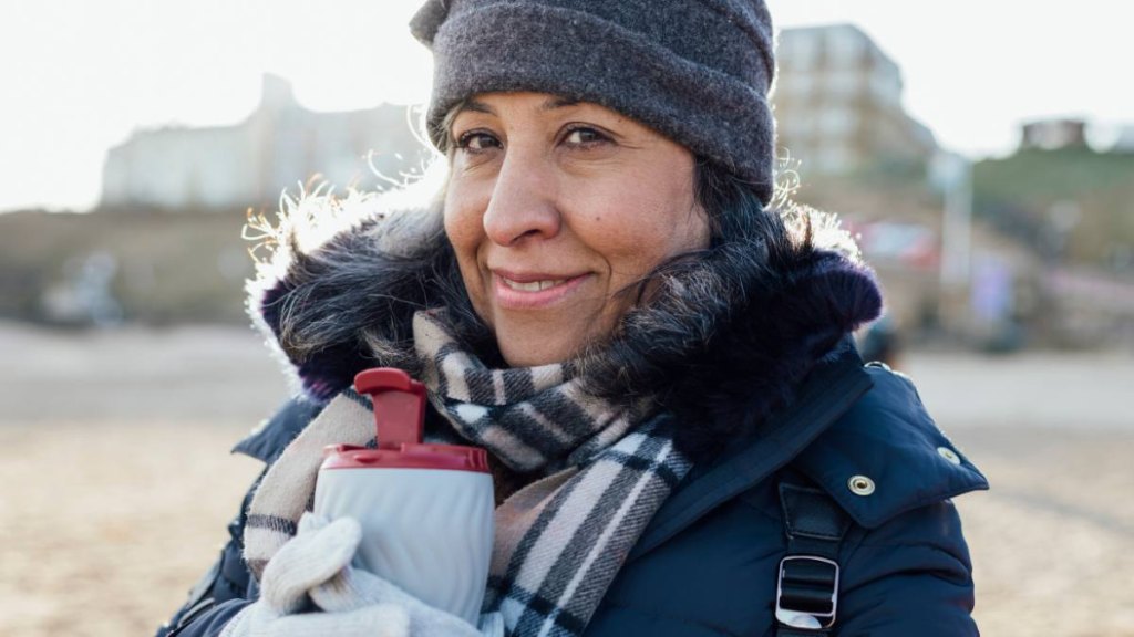 Woman bundled in hat and scarf