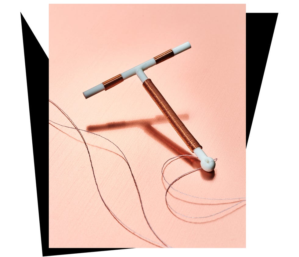 a sewing tool featuring a tshaped handle with copper coil and threads