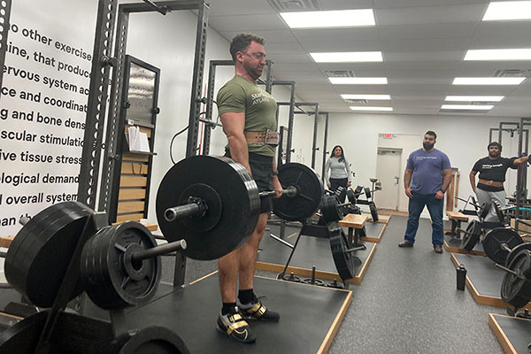 zach locking out a 415 deadlift