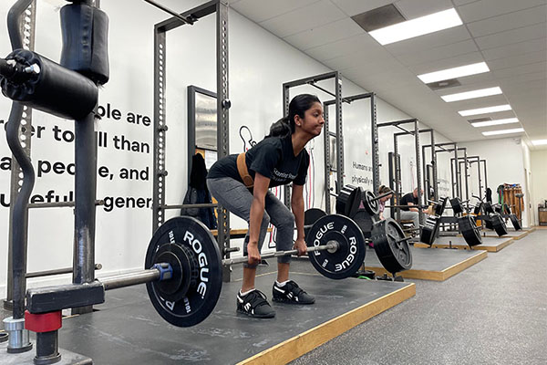 manjushree in the middle of a deadlift