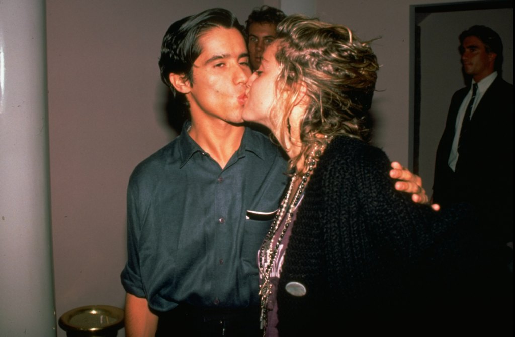 Jellybean Benitez and Madonna share a smooch in 1984