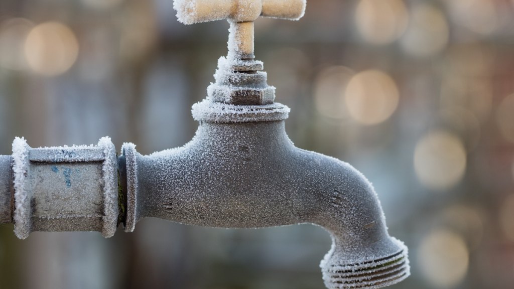 A faucet covered in frost