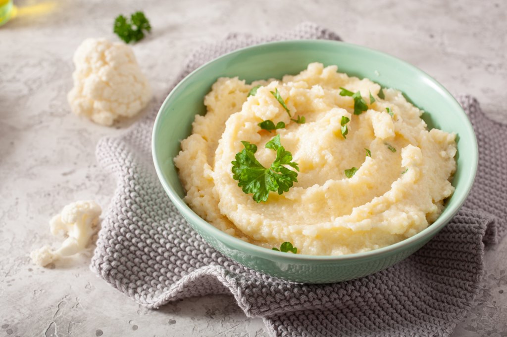 bowl of mashed cauliflower with butter