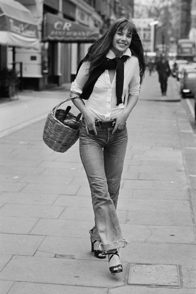 Jane Birkin carrying signature wicker basket