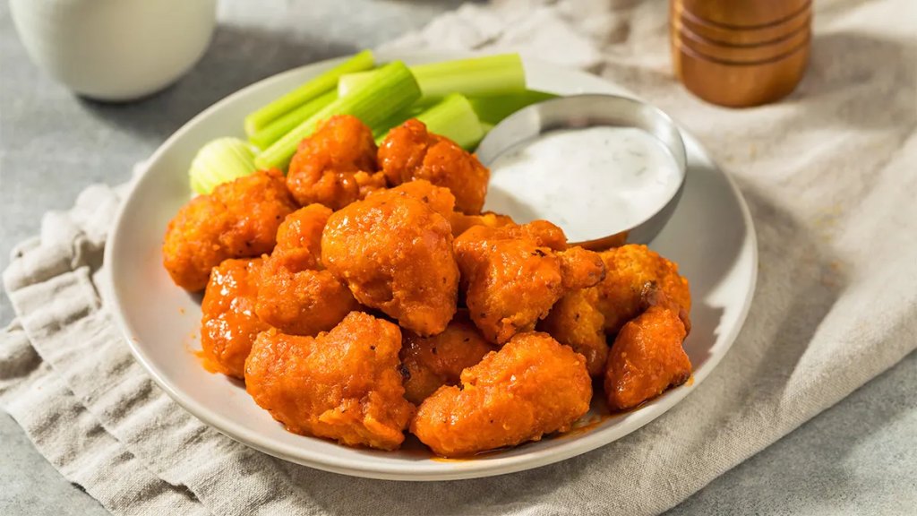 Boneless chicken wings as part of a roundup of Super Bowl snack ideas