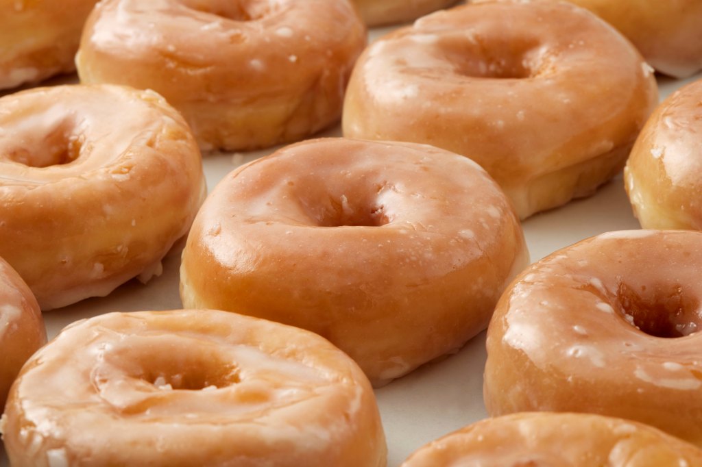 box of a dozen glazed doughnuts from Krispy Kreme for the super bowl